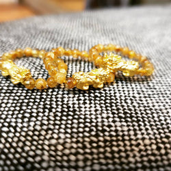 Golden rutilated quartz ring with piyao