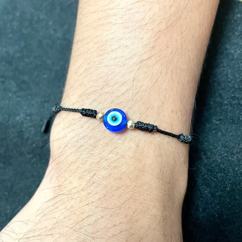 Evil eye bracelet in black thread