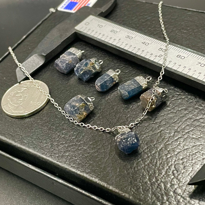 Raw 2025 sapphire pendant